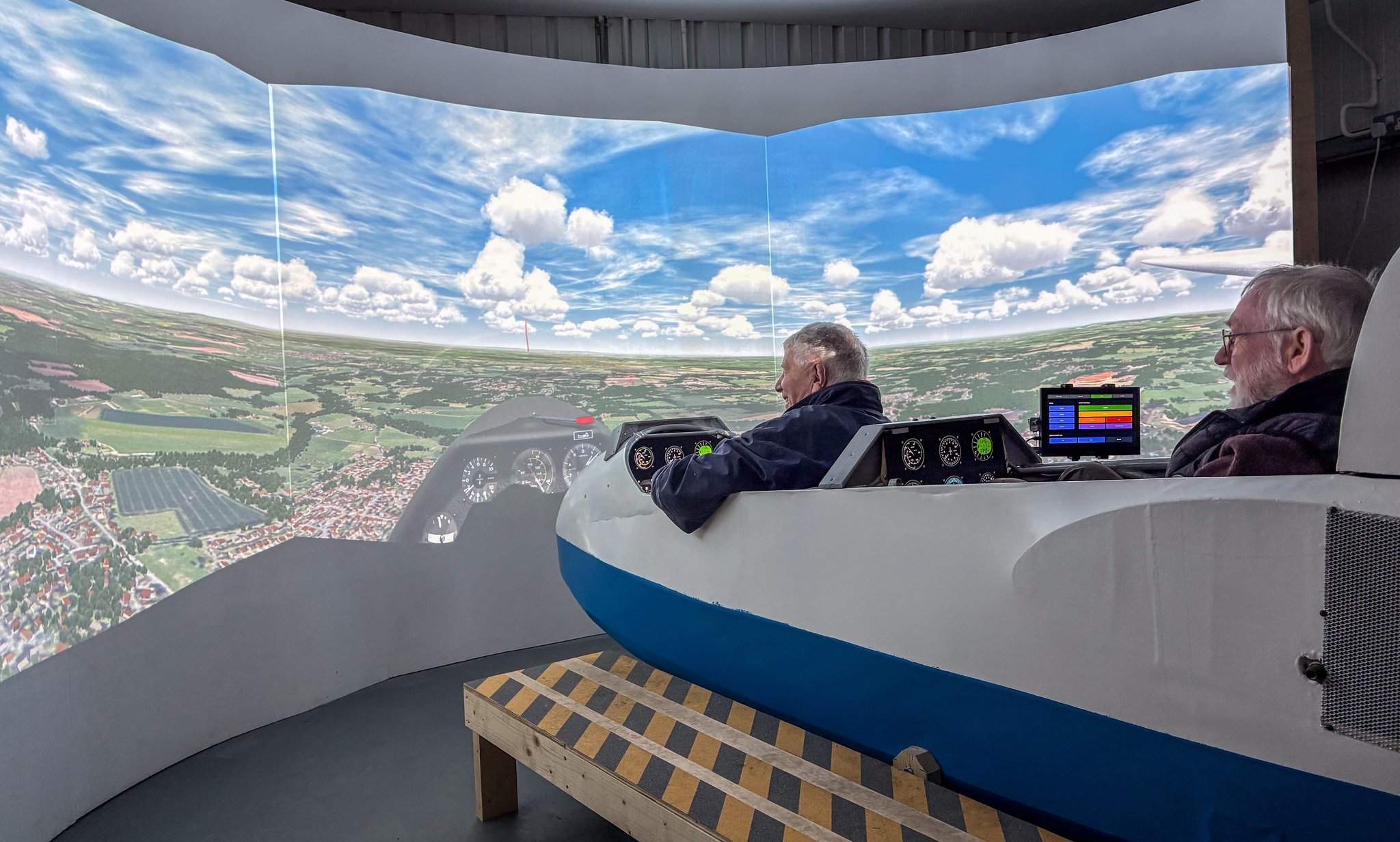 Two pilots in the Southdown gliding simulator